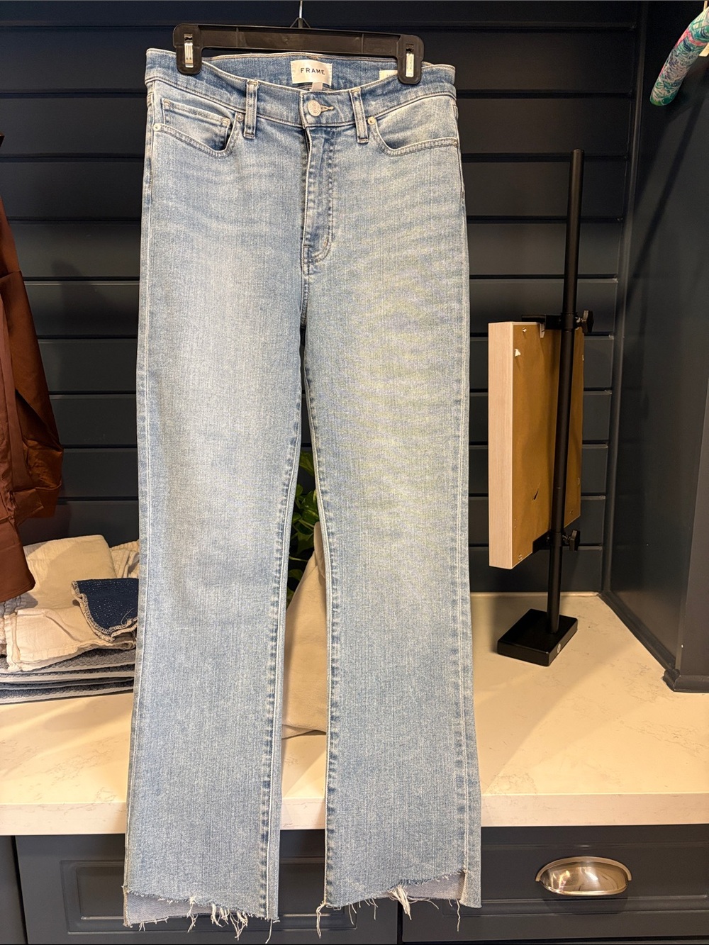 Frame Denim Light Blue Flare Jeans with Raw Hem